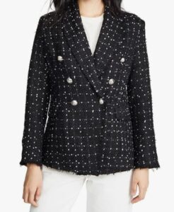 This black boucle jacket will keep you warm during the cool nights and can easily transition to a spring and summer look.